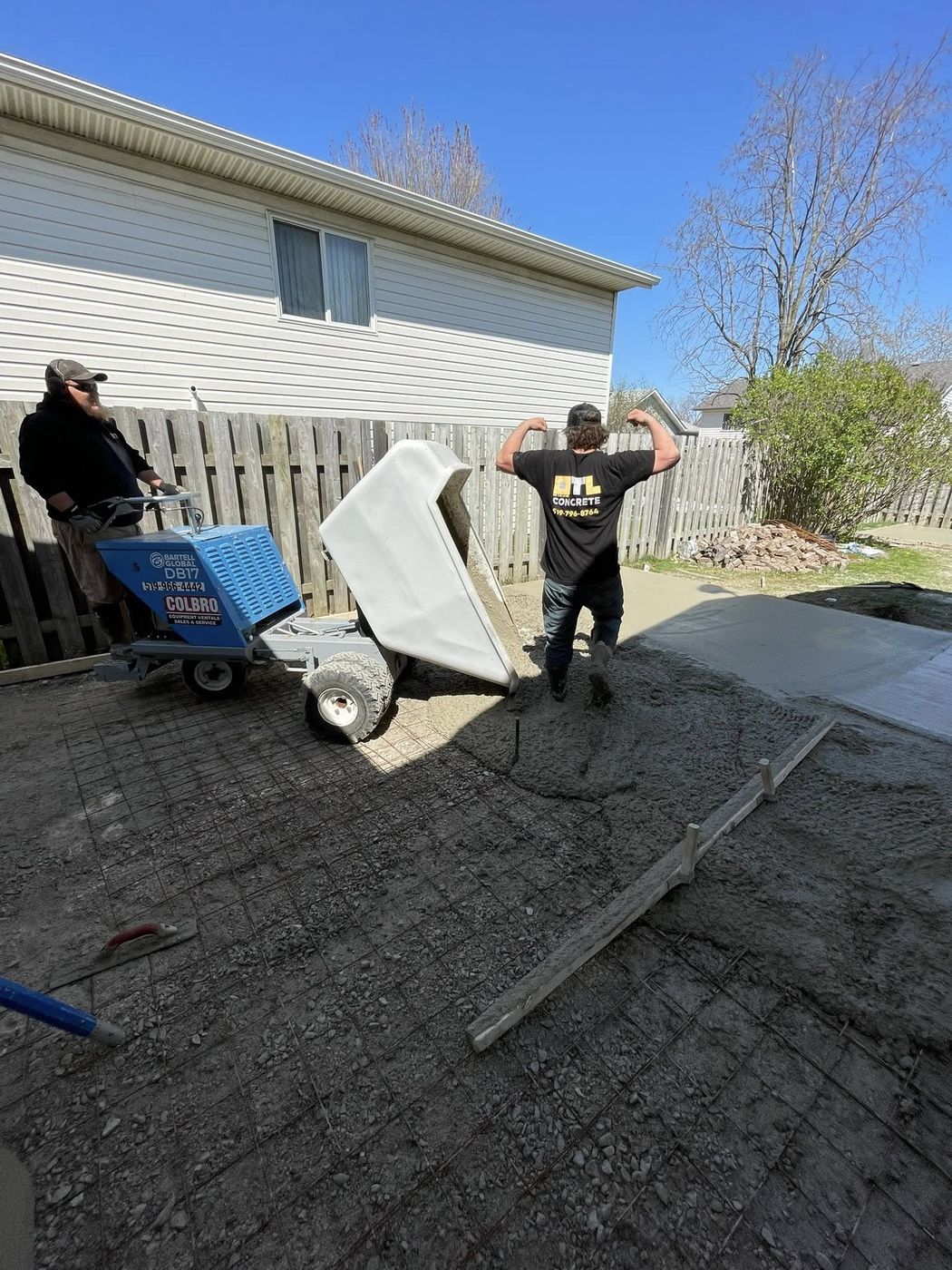OTL crew in branded clothing prepping a site