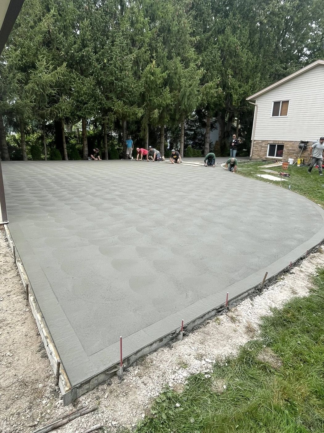 Oversized concrete backyard patio