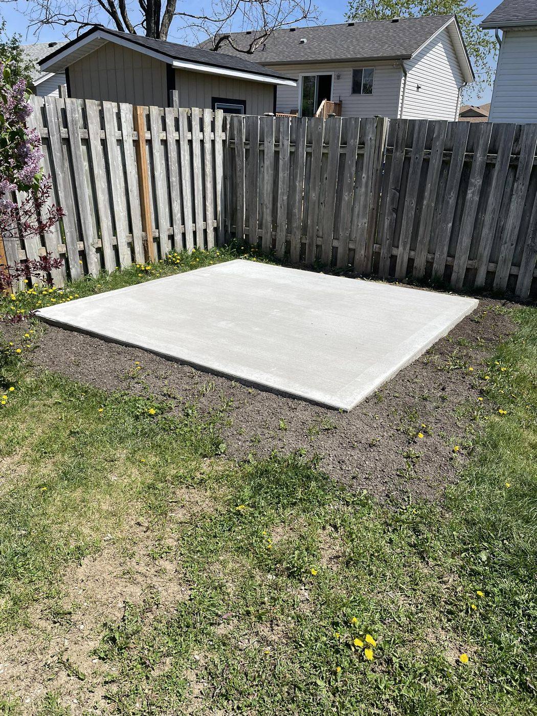 Clean-edged concrete shed pad