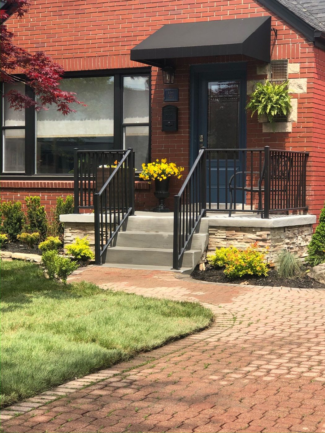 Wide formed concrete entrance steps