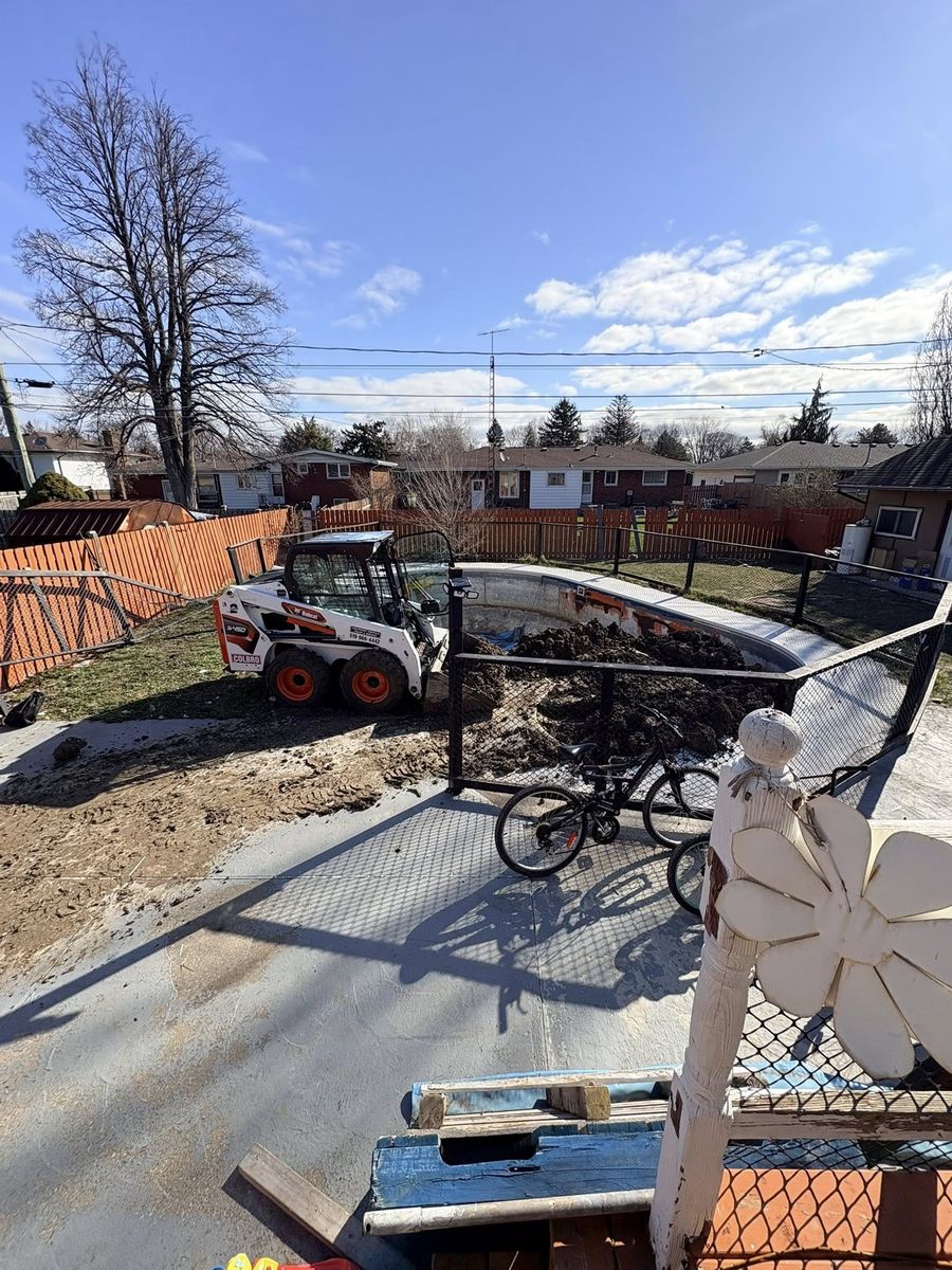 Skid steer excavating for a new concrete pour