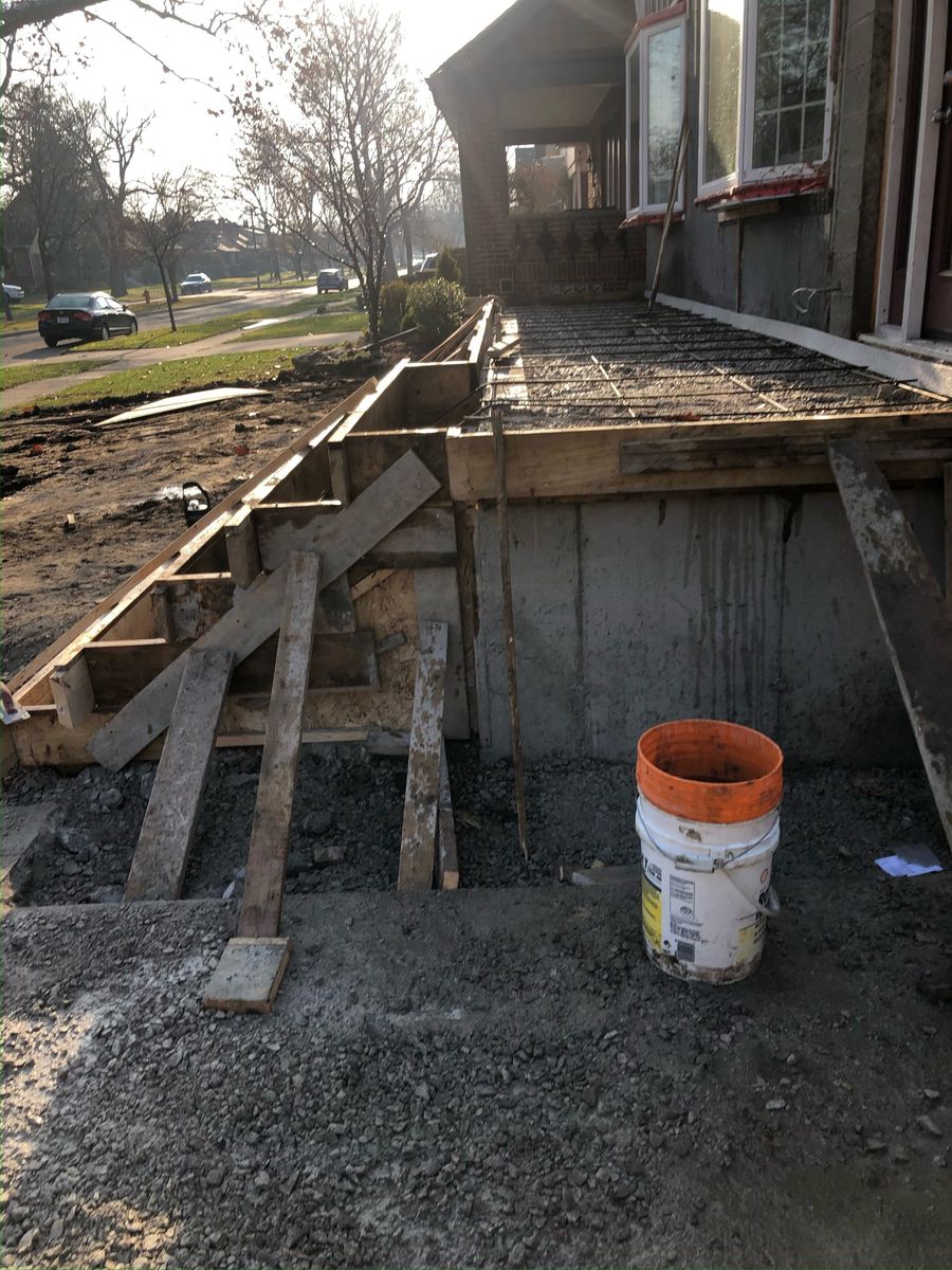 Wood forms set and levelled for entrance steps