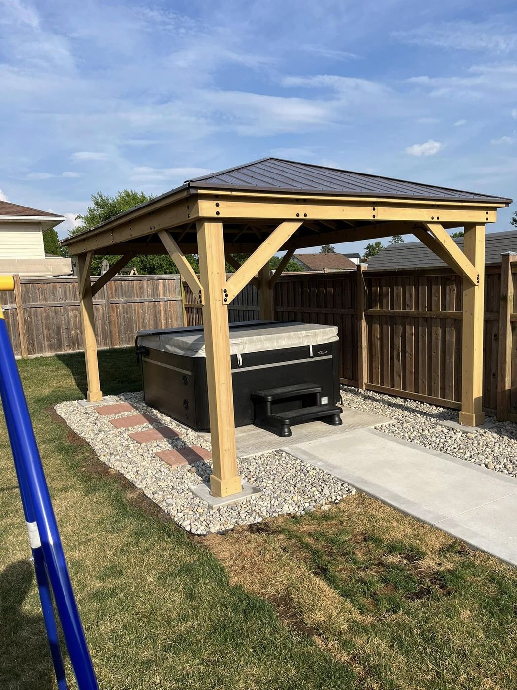 Concrete hot tub pad and connecting walkway