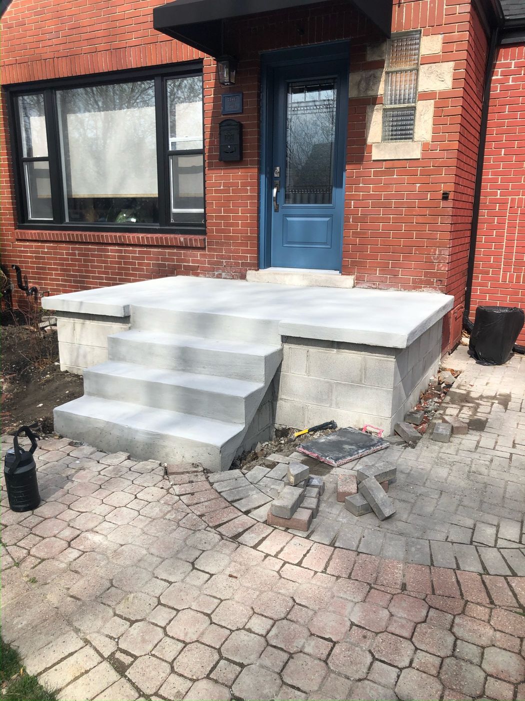 Restored concrete porch and entrance steps